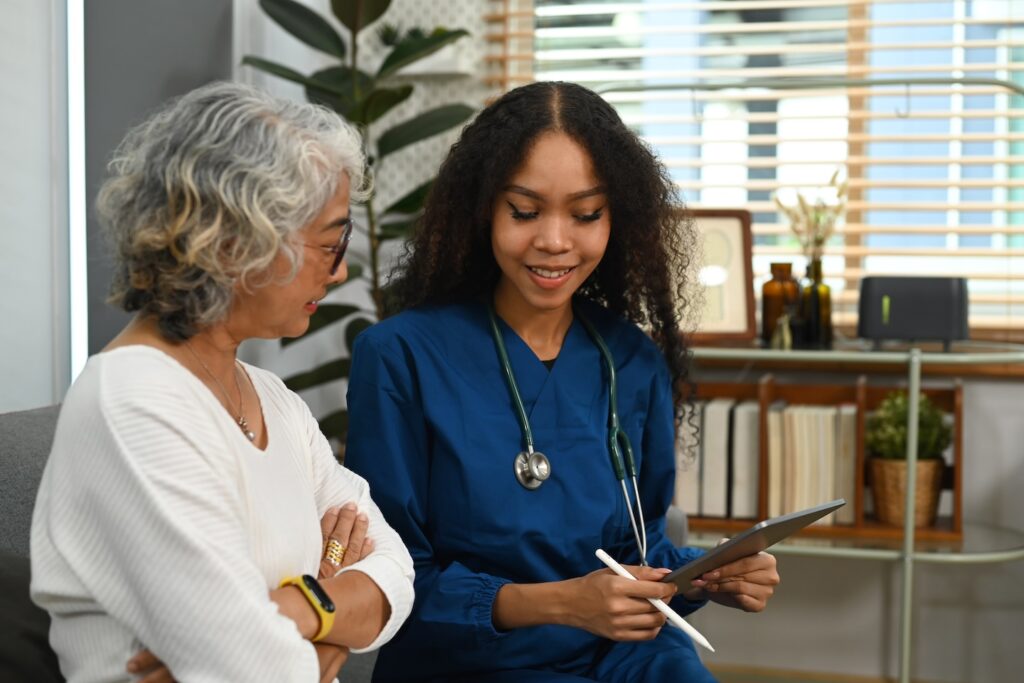 Nurse practitioner with patient