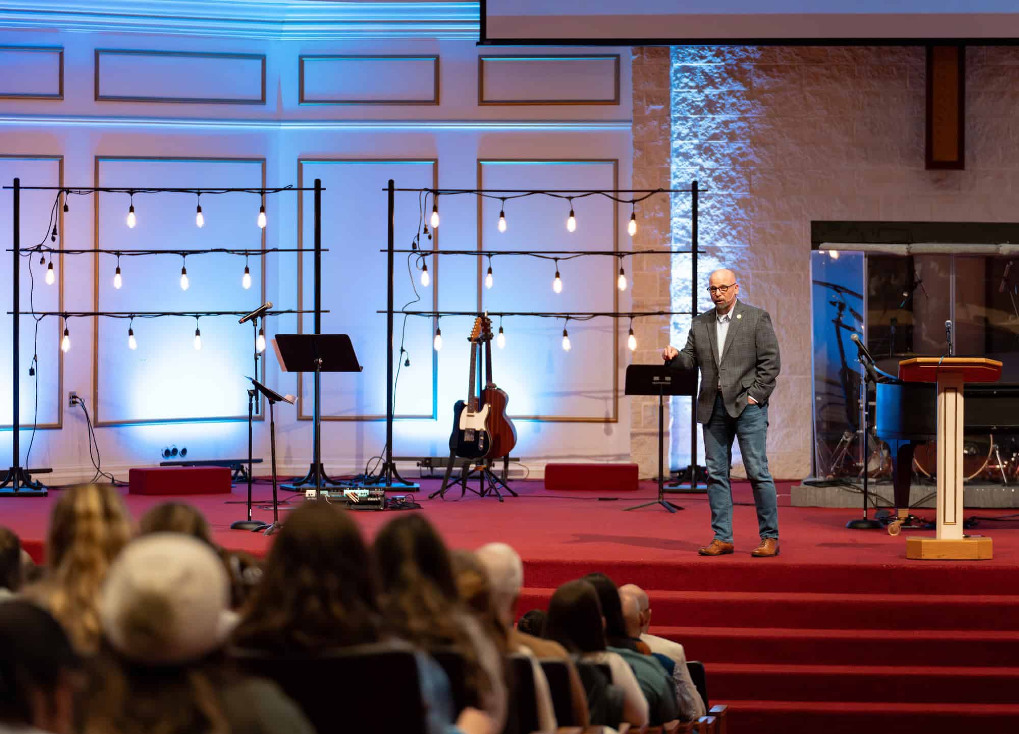 Rev. Brad Kochis, MVNU Chief Development Officer and North Carolina Church of the Nazarene District Superintendent, shares his story with the Homecoming Chapel crowd on Friday.