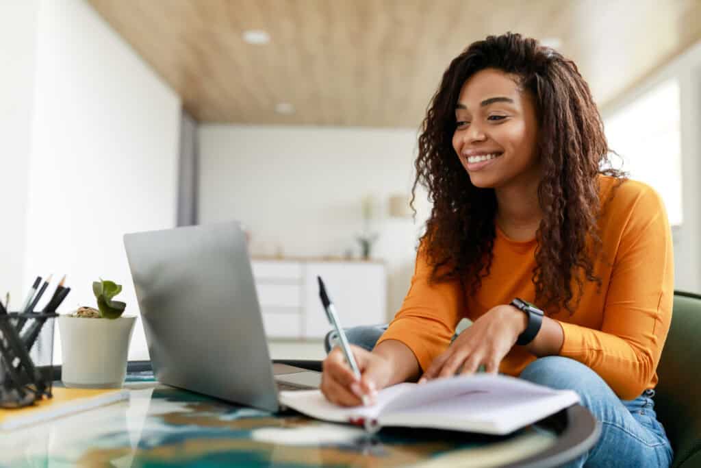 Woman attending a MVNU online business class from her home.