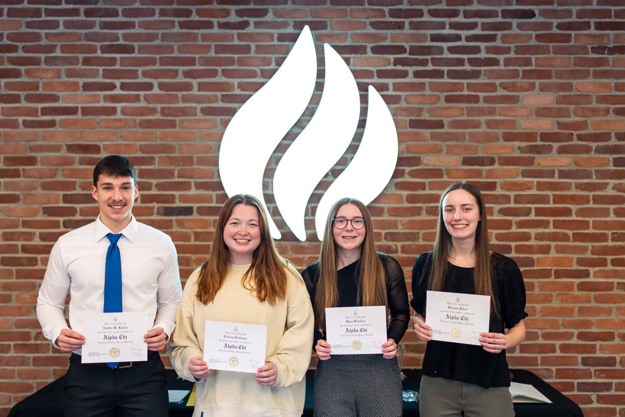 2024-25 Alpha Chi Inductions — Austin Kohler, Delaney Brinkman, Mary Weisburn and Brianna Rider