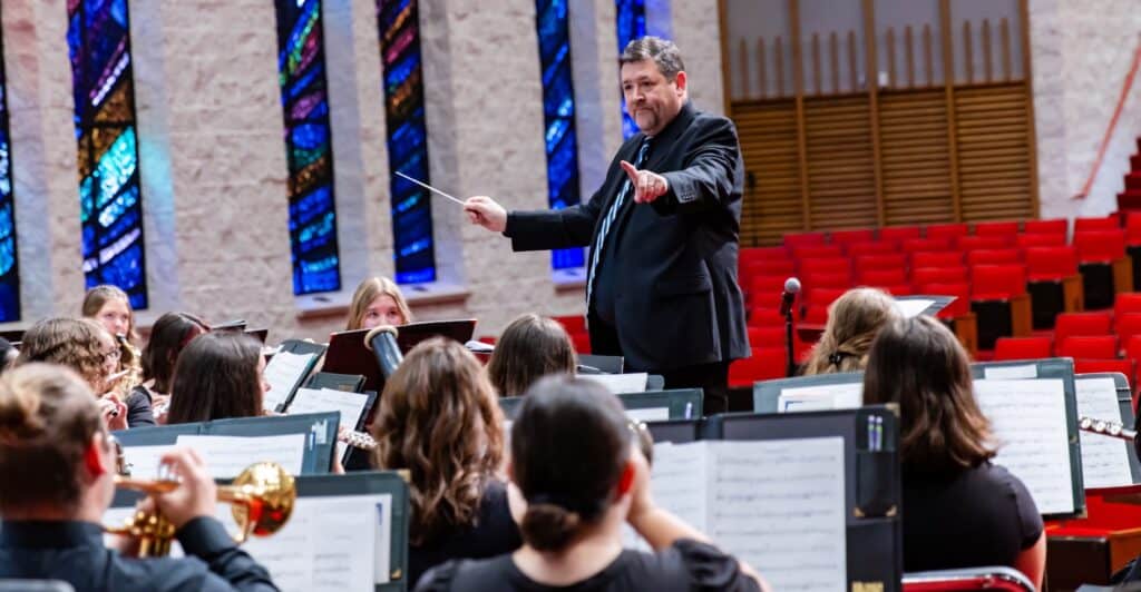 MVNU professor Dr. John Packard, shown here directing during a performance earlier this school year, will lead the Symphonic Wind Ensemble at their spring concert, to be held Tuesday, March 25, in the R.R. Hodges Chapel/Auditorium. The event, which begins at 7:30 p.m., is free and open to the public. (Photo courtesy of Mount Vernon Nazarene University)