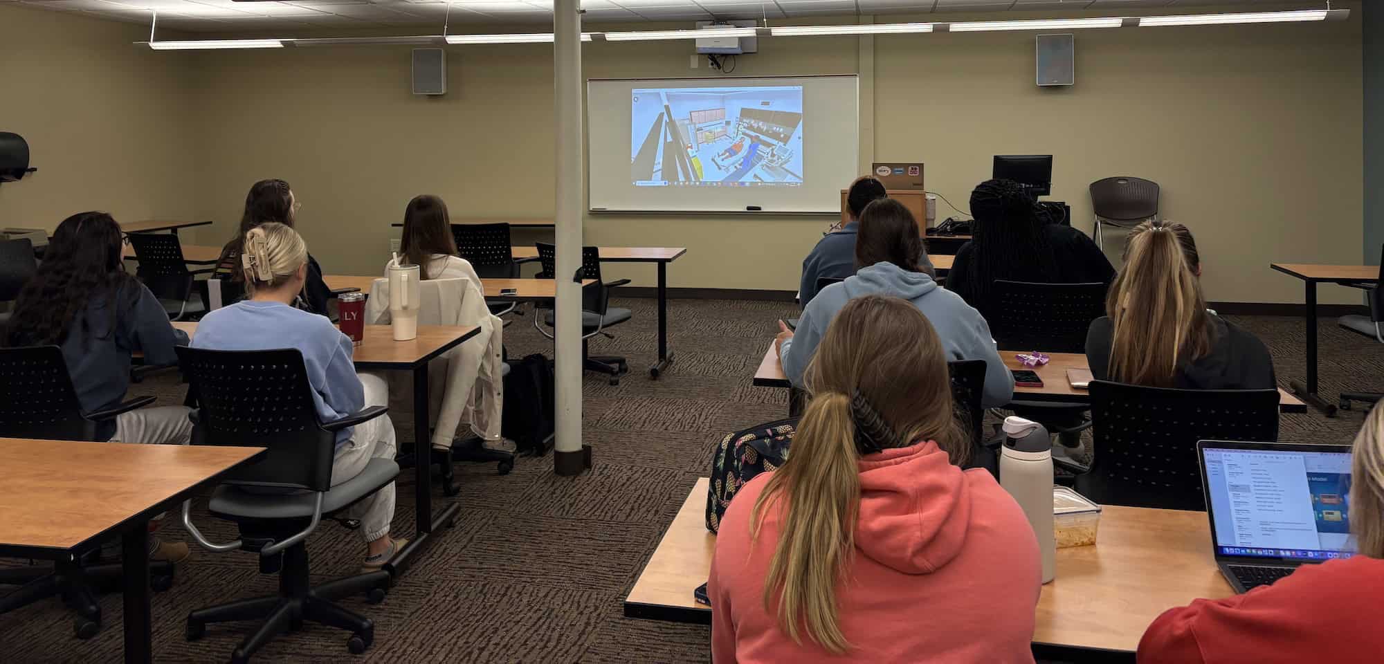 Mount Vernon Nazarene University Assistant Professor of Nursing Esther Rudolph, not shown, demonstrates the new SimX Virtual Reality software to one of her classes this semester. The software, when paired with a Meta Quest VR headset, is changing the way students prepare for real life situations in a classroom setting. (Photo courtesy of Mount Vernon Nazarene University)
