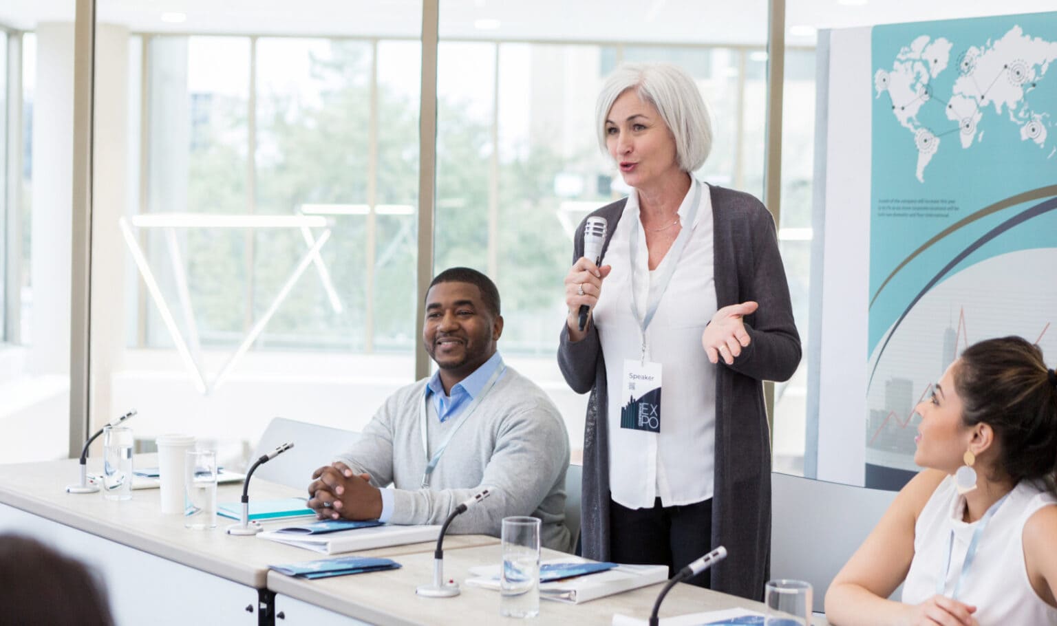 Effective business presentation at a conference with diverse professionals.