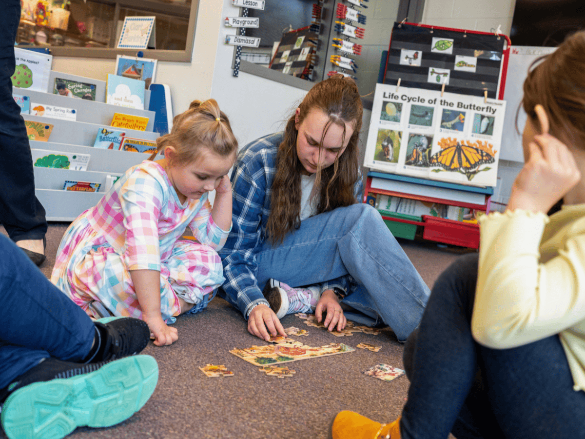 Building blocks and educational posters in a classroom setting.