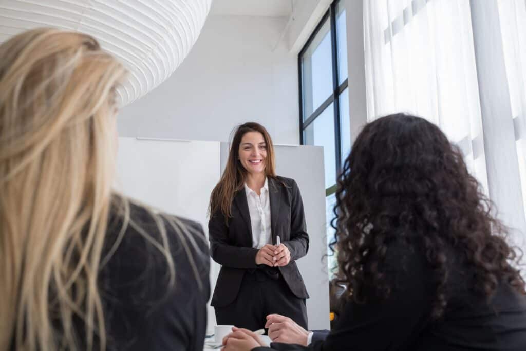 Professional woman leading a workplace presentation, representing Cincinnati professionals pursuing MVNU’s online Master of Organizational Leadership.
