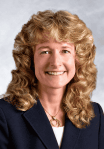Portrait of Dr. Kimberly K. Loscko, DVM smiling in professional attire.