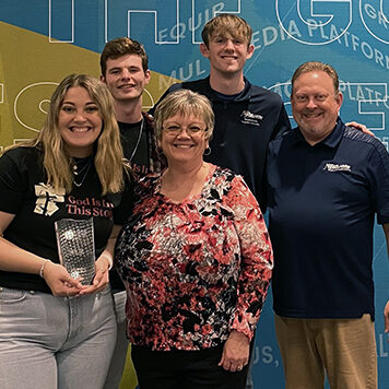 WNZR staff celebrate University Station of the Year award